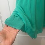 Gianni Bini green Ruffle One Piece romper size large. Photo 4