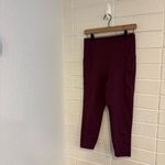 Girlfriend Collective  Compressive High-Rise Pocket cropped Leggings in plum Photo 1