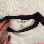 Brandy Melville  John Galt Baby Graphic Tee Photo 1