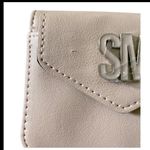 Steve Madden NWT- Pink blush wallet, front snap compartment, logo in front, still has plastic protector Photo 2