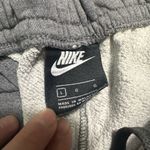 Nike Men's Cuffed Leg Distressed Sweatpants Size Large Grey Photo 2