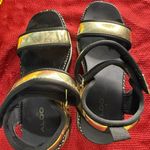 ALDO  size 6.5 Gold and Black Sandals with Chunky Sole Photo 1