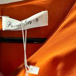 NWT women’s orange long sleeve, open sides dress Photo 2