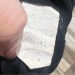 One star shiny black sleeveless blouse Photo 5