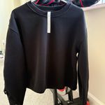 Lululemon black braided sleeve cropped pullover sweater size 8, style #LW3EVVS Photo 1