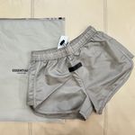Fear of god Essentials Desert Taupe Running Shorts Photo 1