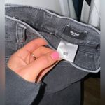 EXPRESS High Waisted Black Ripped 90s Bootcut Jeans Photo 7