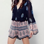 Free People  Janpath Bell Sleeve Romper‎ in Black Pink Size Small Photo 0