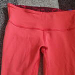 Lululemon  athletica reversible leggings in orange and  red in size 4 Photo 4