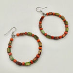 Orange and green beaded circle earrings Photo 0