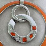 Boutique Silver Choker Necklace with Orange Enamel Circle Pendant and Earrings Set Photo 3
