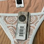 Ris-k Nude And White Bikini Bottom Photo 3