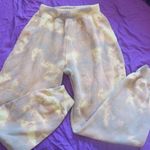 Pretty Little Thing tie dye sweatpants loungewear in yellow and brown size 2. Photo 0