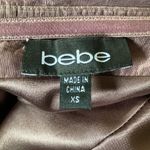 Bebe  strapless mini dress with embellishments ruching & tu;ip skirt size xs Photo 4