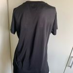 The North Face v-neck women’s size small black T-shirt Photo 4