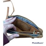 Brown quilted leather crossbody bag Photo 5