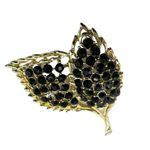 Black beaded gold tone double leaf brooch Photo 0
