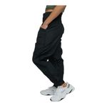 Free People Movement NWT--THE WAY HOME JOGGERS-BLACK-SIZE MEDIUM-MSRP $60 Black joggers, wide smocked waistband, pull on style, front hip pockets, 100% nylon, brand new with tags Measurements: Waist: side to side 15-18 inches Inseam: 28 inches  Photo 5