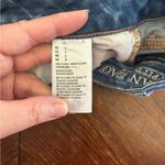 American Eagle  hi rise distressed shortie crochet pocket detail size 4 Photo 3