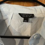 Top shop size 4 women’s top. Perfect for going out to the beach! Photo 1