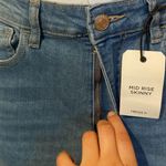 Forever 21 Mid-Rise Skinny Jeans Photo 1