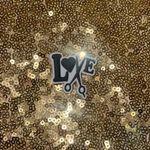 Croc charm hairdresser Photo 0