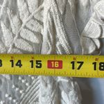 EXPRESS  embroidered ivory floral top in size large. Photo 7