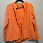 Lululemon Athletica Orange Raincoat with Hood and Water-Resistant Fabric Photo 0