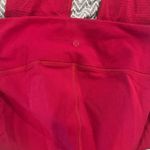 Lululemon  ruby red‎ reveal tight interconnect 25.5”leggings size 10 Photo 6