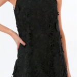 Tuckernuck  Guipure Lace Blythe Dress bow mini sleeveless black tie ruffle neck Photo 0