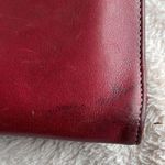 Cole Haan red leather wallet with checkbook flap. Photo 4