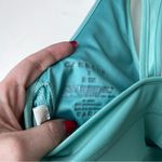 Carbon 38 Action Bra 2.0 in Takara Shine & High Rise 7/8 Leggings in Wasabi S Photo 8