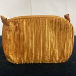 Givenchy Gold Textured Makeup Case by Organza de  Photo 1