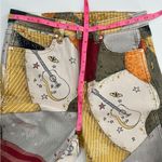 Wrangler NWT  x Lainey Wilson Printed Patchwork Sundown Flare Jeans Sz 26 Photo 5