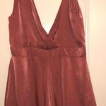 B.Original Asymmetrical Rust Romper Photo 0