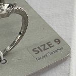 Boutique Assorted size 9 silver rings with new on card rings Photo 1