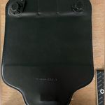 Good condition o pocket with 2 interchangeable flaps and handle. Black Photo 9