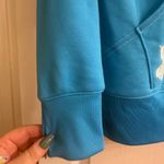Under Armour  Women’s Bright Blue Fleece Long Sleeve Hoodie - size M Photo 2