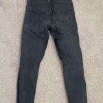 American Eagle skinny jeans with rips in knees Photo 1