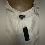 Lulus  CONSIDERABLY CUTE WHITE SWISS DOT BUSTIER
RUFFLED ROMPER Photo 2