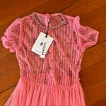 Elegant Pink Midi Dress with Star Accents Photo 7