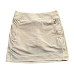 Athleta light yellow mini tennis skirt size 4 Photo 0