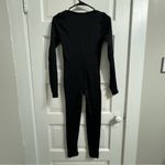 black jumpsuit Photo 1