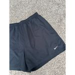 Nike dri fit athletic running black shorts women’s size large loose fit gym Photo 1