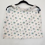 We Wore What Blue Floral Cut Out Denim Mini Skirt NWT Size Medium Photo 1