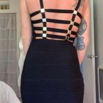 2b Bebe women size XS Y2K bandage black dress and gold accents on the back Photo 0