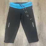 Nike  Black and Blue Athletic Leggings size small Photo 1
