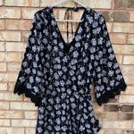 Entro Black Floral Print Romper Photo 0