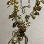 Charm necklace with earth, tone beads Brown Photo 4