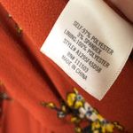 Francesca's Francesca’s Miami Floral Long Sleeve Faux Wrap Jumpsuit Orange Medium Photo 6